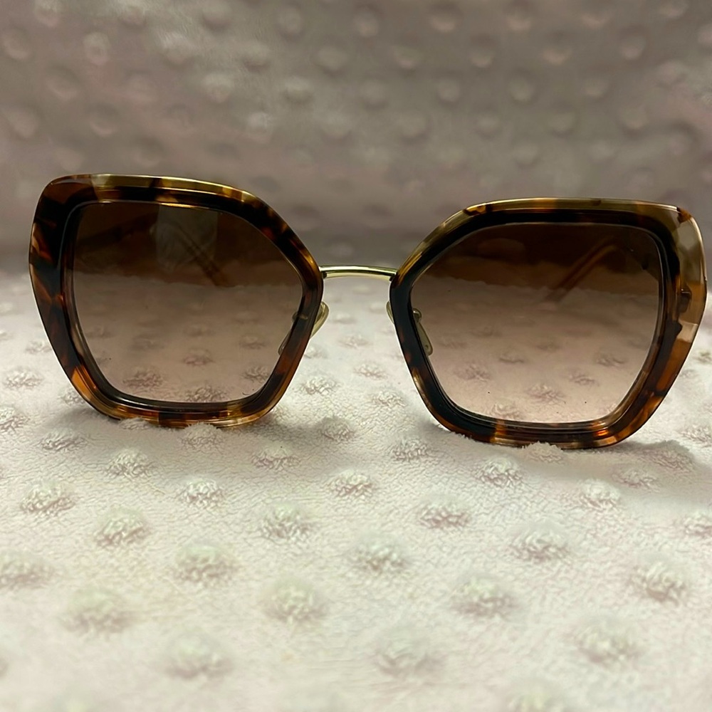 Prada rose gold sunglasses, barely used, in excellent condition.